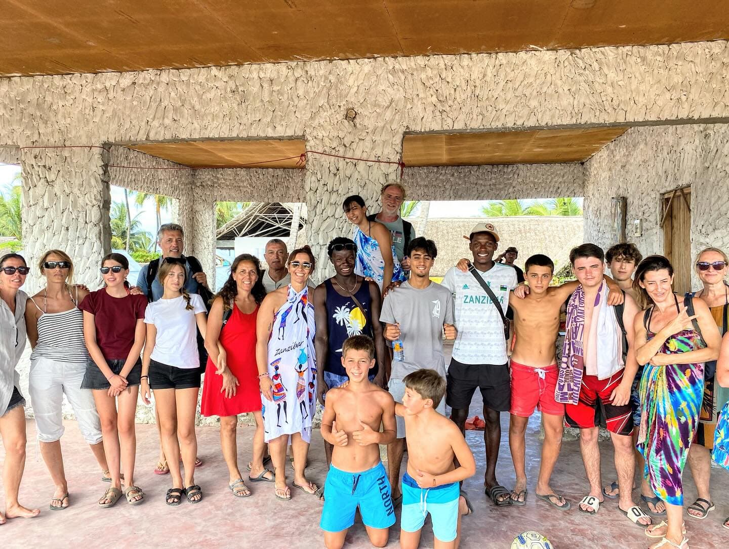 Happy travelers sharing their Zanzibar experiences with Captain Mussa